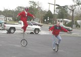 Nik and Stive unicycles 2002 Dec25.jpg